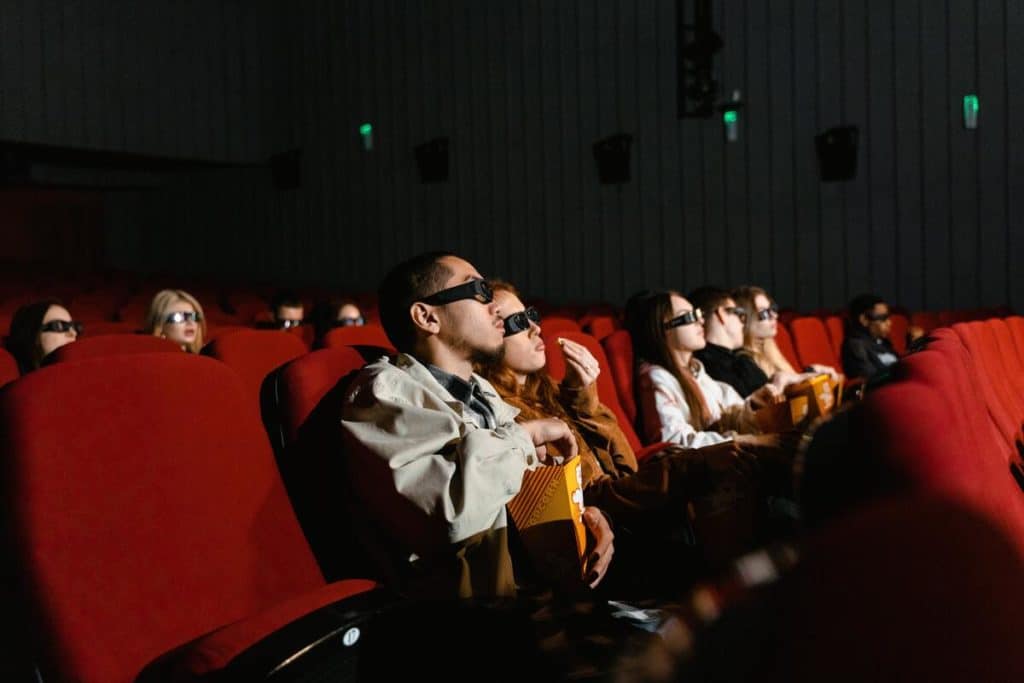 People watching a movie in the cinema